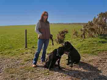 Jane with her two black labradors